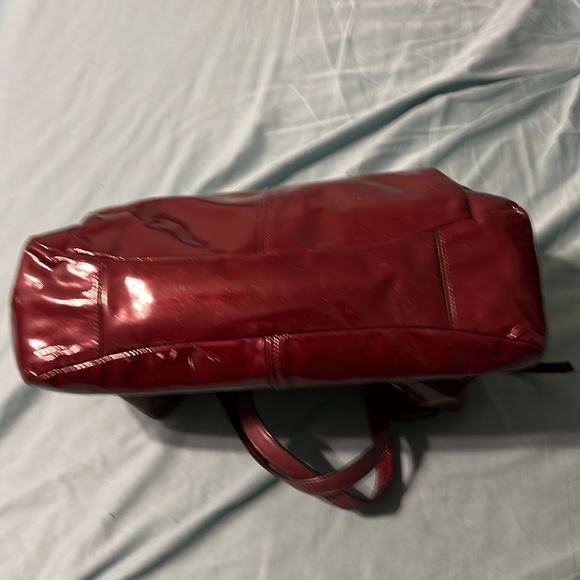 Patent Leather red used coach bag some wear scratches.Still nice,pouches in it. - Picture 15 of 16